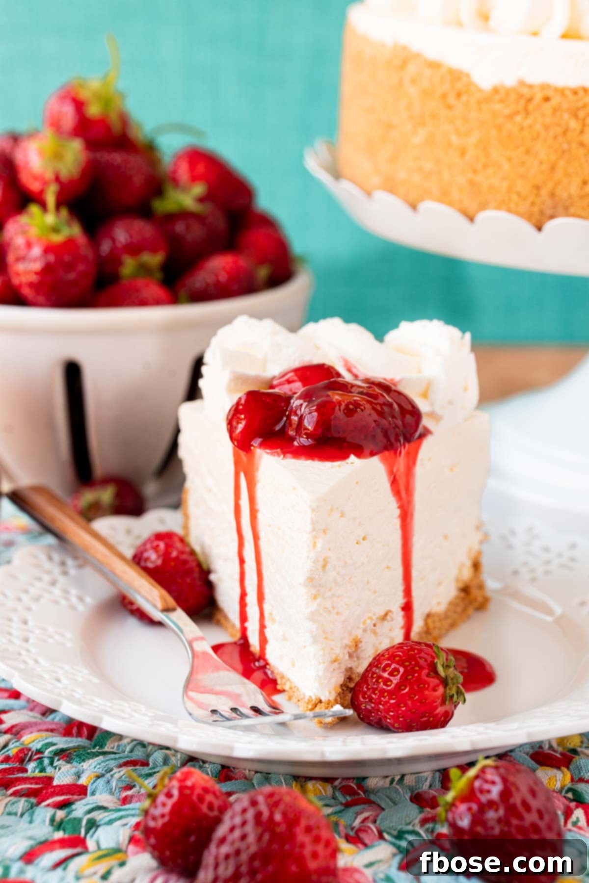 A slice of no bake cheesecake on a white plate.