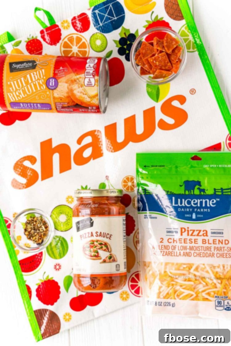 Ingredients to make mini pizzas on a shaws reusable bag.