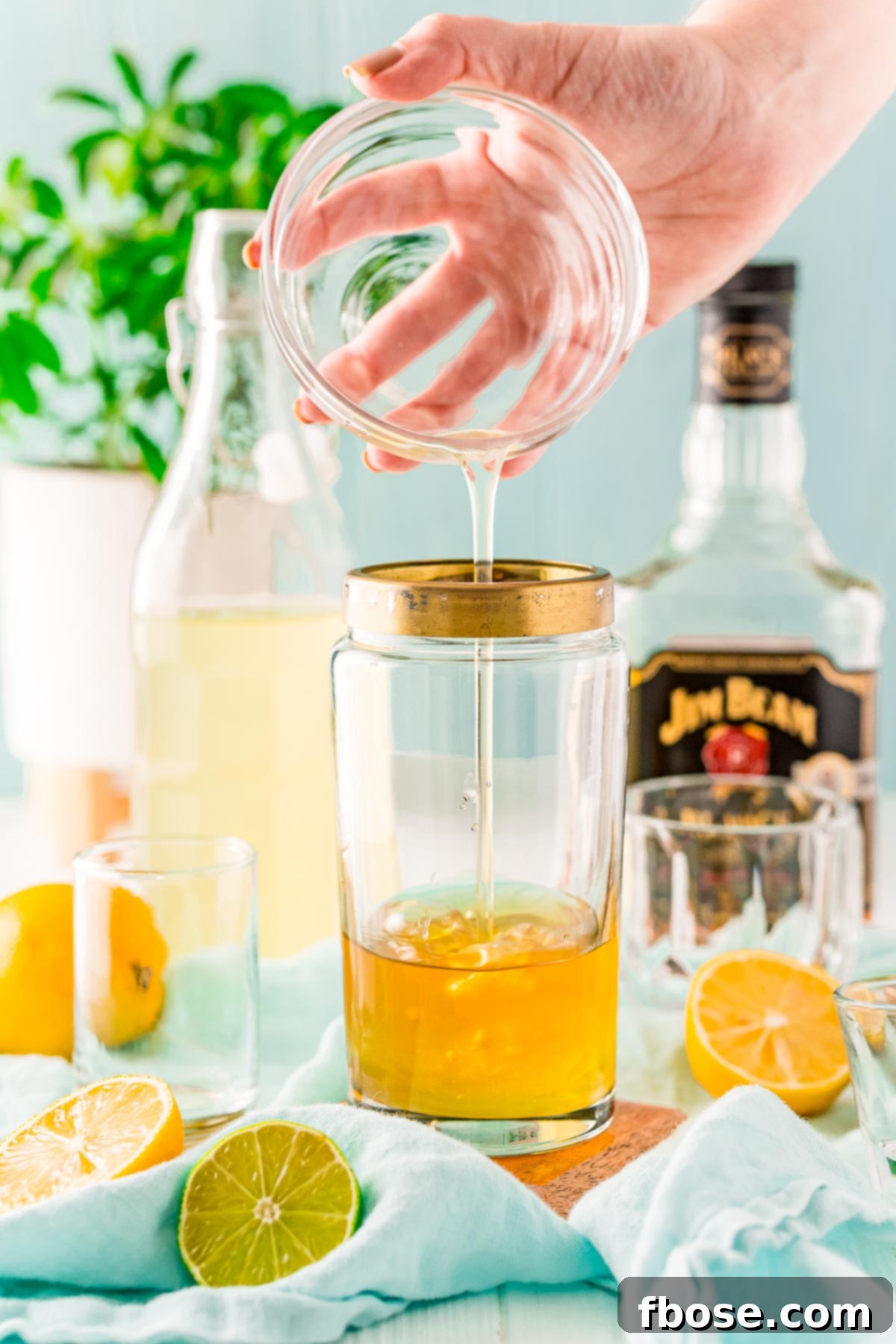 Crafting the Perfect Bourbon Sour 6 Egg white being added to a cocktail shaker.
