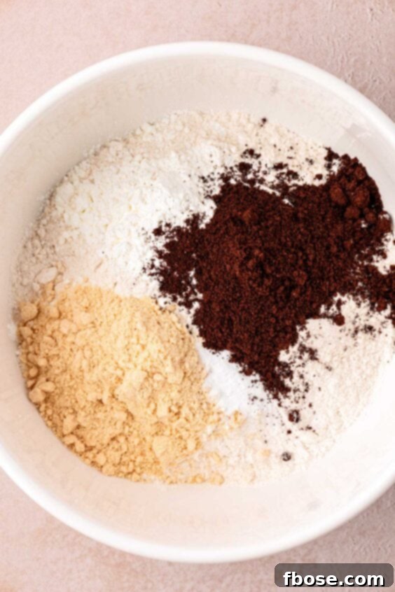 Dry ingredients to make cookies ready to be mixed in a bowl.