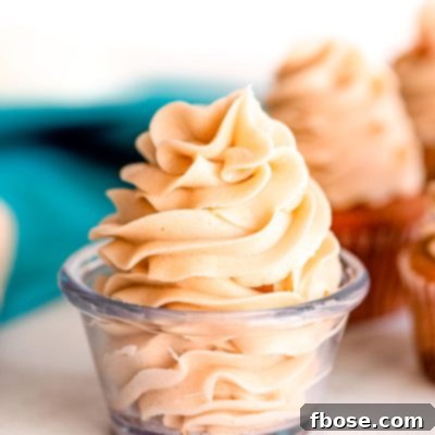 Simple Brown Sugar Delight 10 Close up photo of brown sugar frosting in a glass prep bowl.