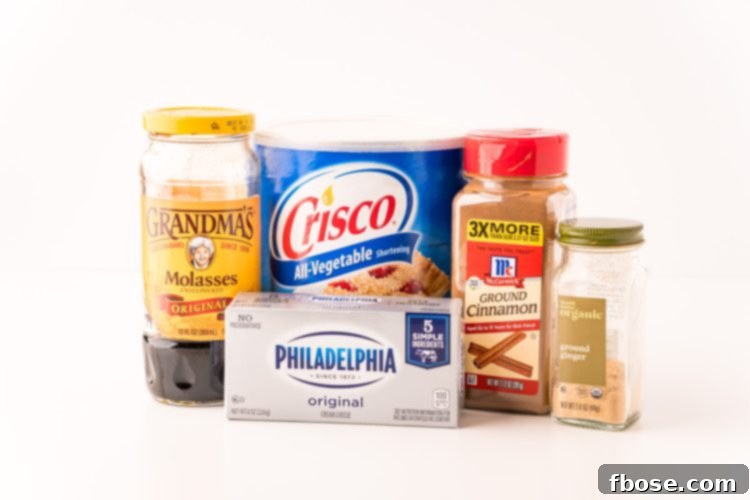 Ingredients used in gingerbread bars on a white table.