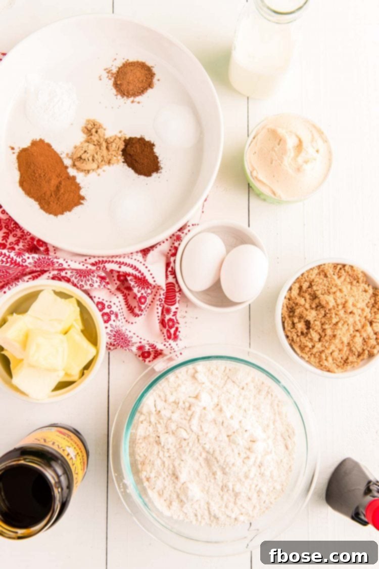 Zencefilli Sandviç Kurabiye, Kahverengi Şeker Kremalı 3 Overhead photo of ingredients to make gingerbread whoopie pies in prep bowls on a white table.
