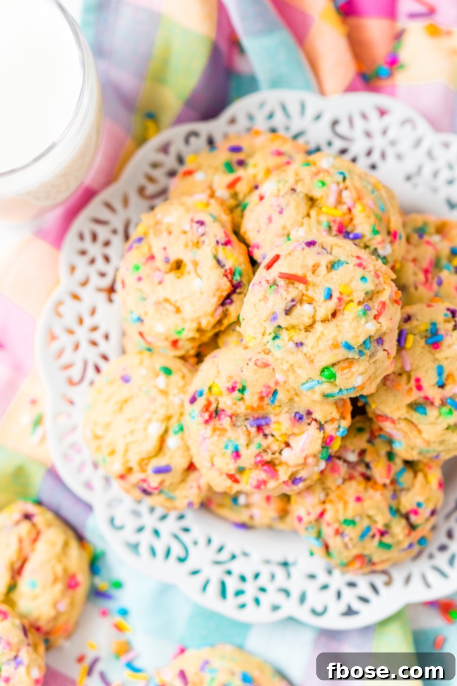 A festive arrangement of Birthday Cake Pudding Cookies, adorned with sprinkles, perfect for sharing and celebrating.