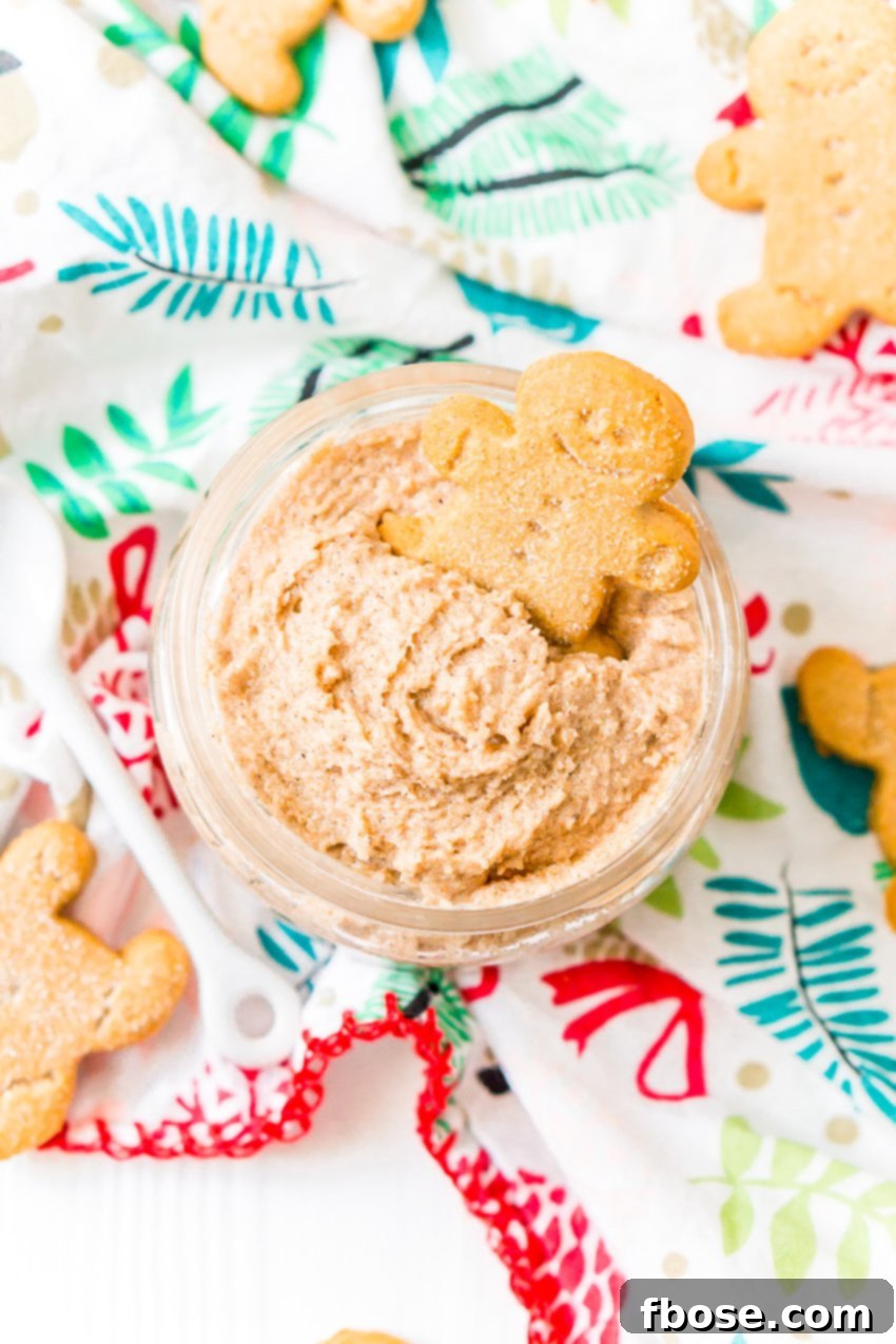 Decadent Gingerbread Skin Polish 3 Close-up of the smooth, whipped texture of the gingerbread sugar scrub, presented in a clear glass jar.