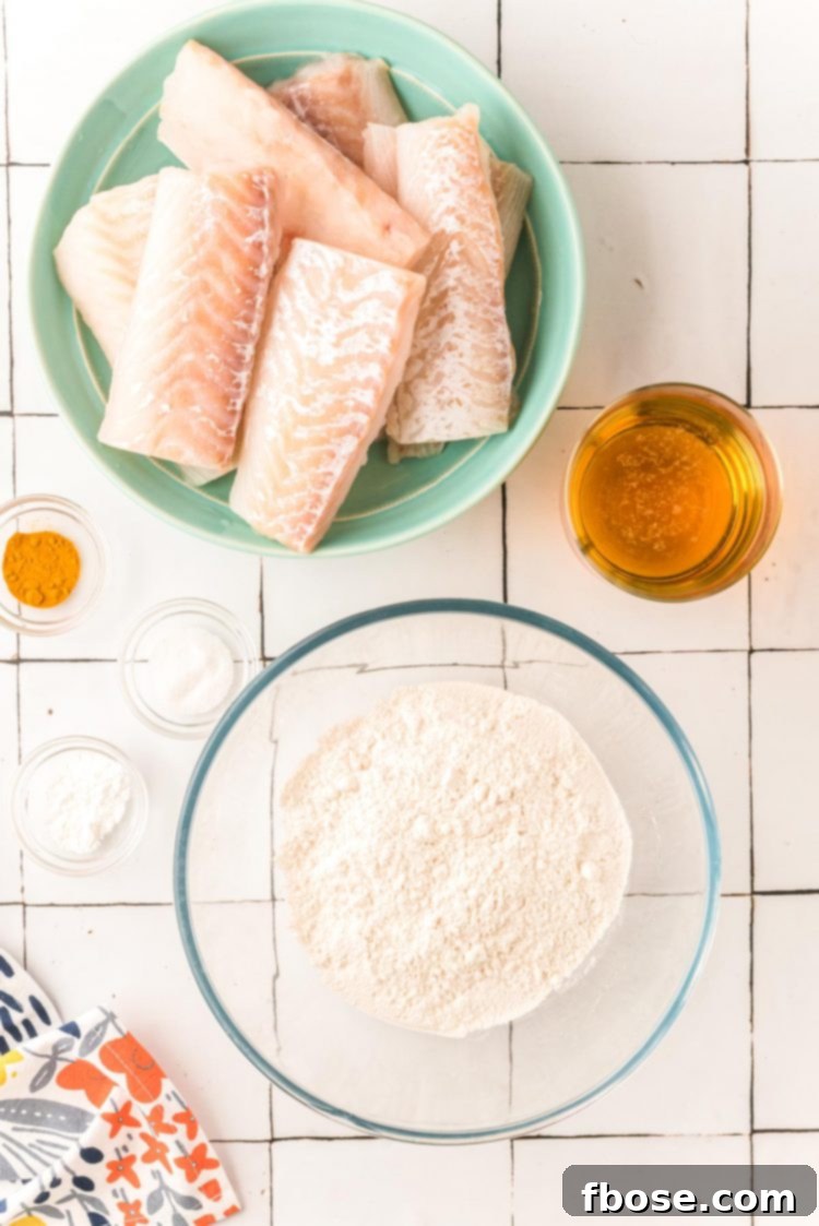 Crispy Beer-Battered Fish and Chips 4 Overhead photo of ingredients to make fried fish.