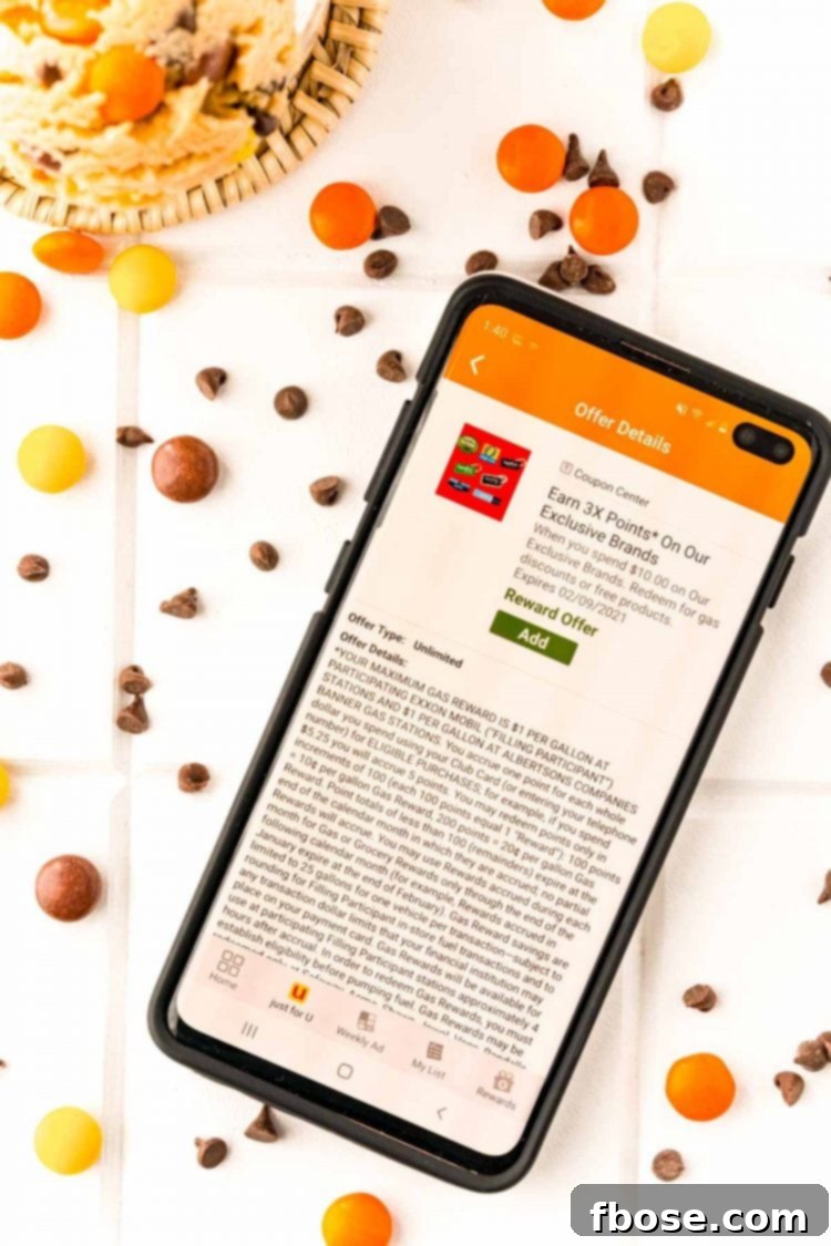 A smartphone displaying the Shaw's grocery app, highlighting savings and rewards.