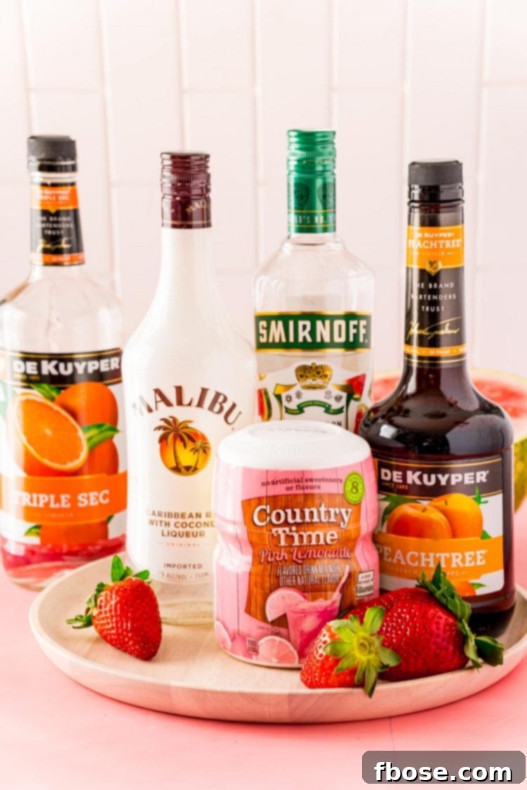 Groovy Nectar 4 A flat lay photograph showcasing all the fresh fruits and bottled spirits used to prepare the Hippie Juice Cocktail, neatly arranged on a white surface.