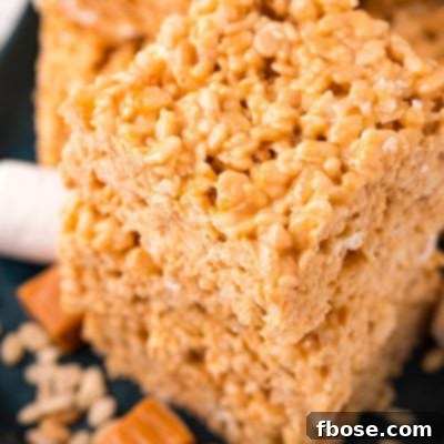 Close up photo of a stack of salted caramel rice krispie treats.