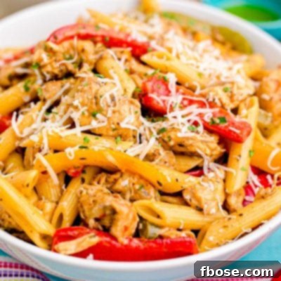Close up photo of a bowl of Rasta Pasta on a colorful linen napkin.