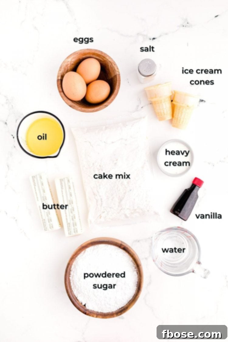 Ingredients to make ice cream cone cupcakes prepped on a white table.