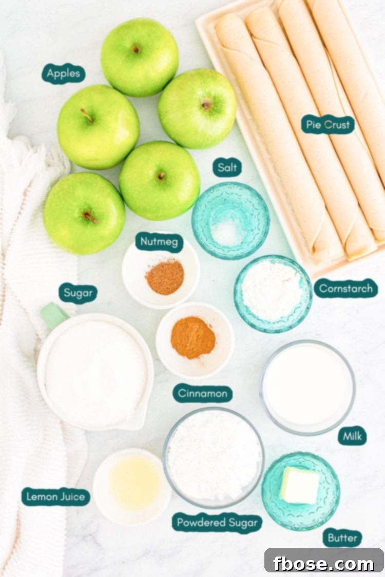 Overhead photo of ingredients prepared to make apple slab pie on a marble table.