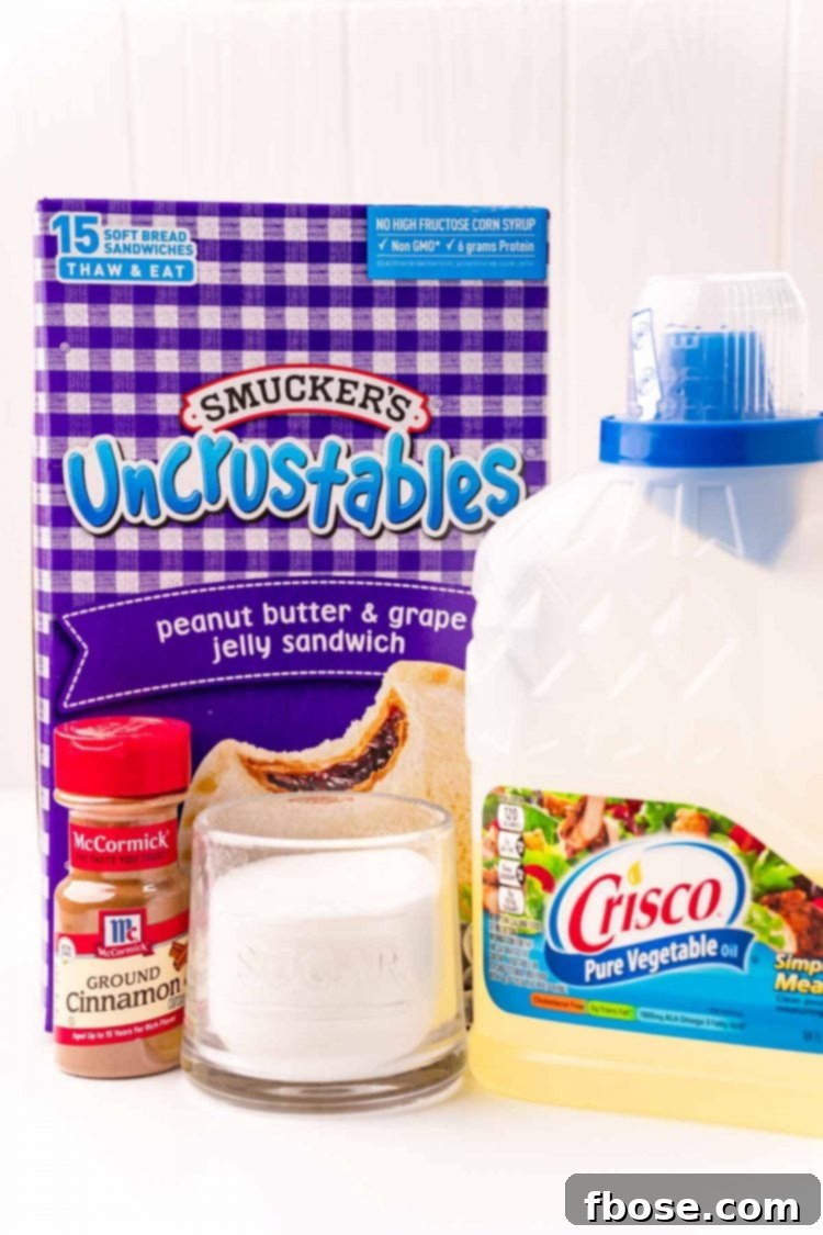 Viral Uncrustables Donut Hack 4 Ingredients to make uncrustables donuts on a white table.