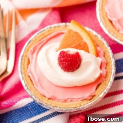 Close up photo of kool-aid pie on a pink and blue striped napkin.