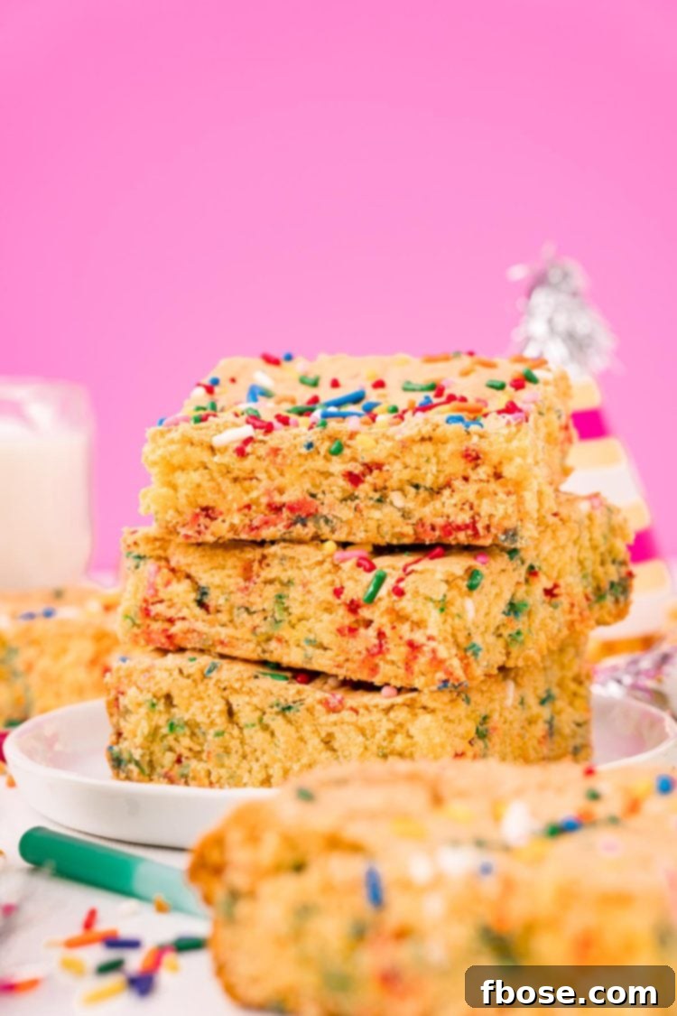 Straight on shot of a stack of three cake mix brownies.