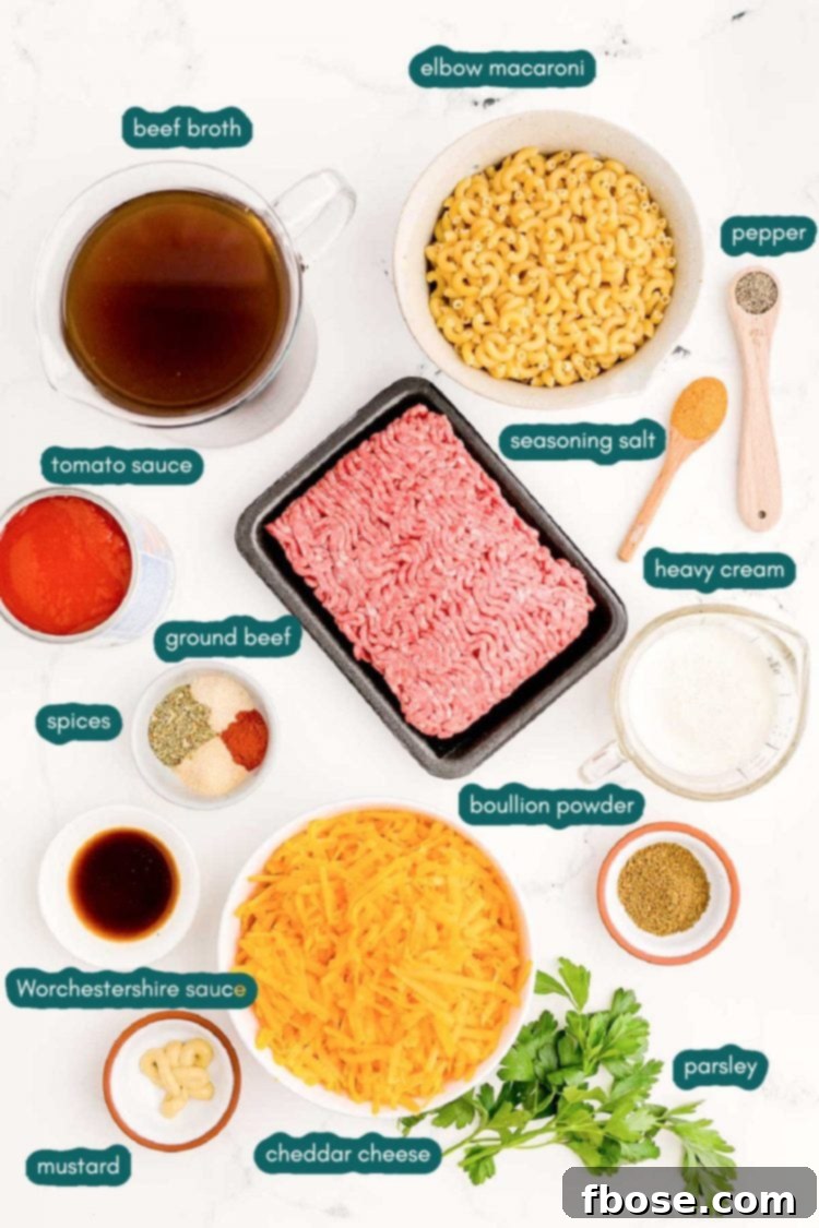 Photo of ingredients to make homemade hamburger helper prepped on a white counter, ready for cooking.