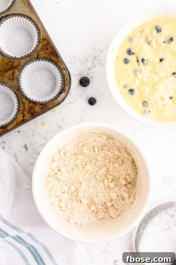 Streusel being made in a bowl.