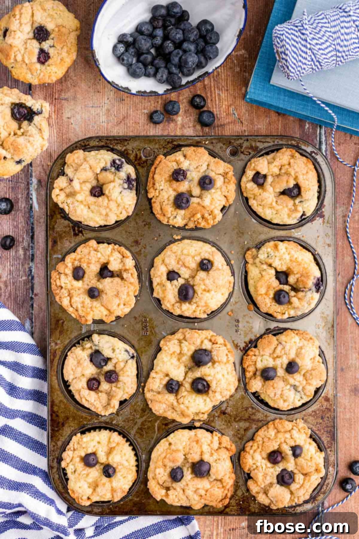 Overhead photo of a pan of blueberry streusel muffins.