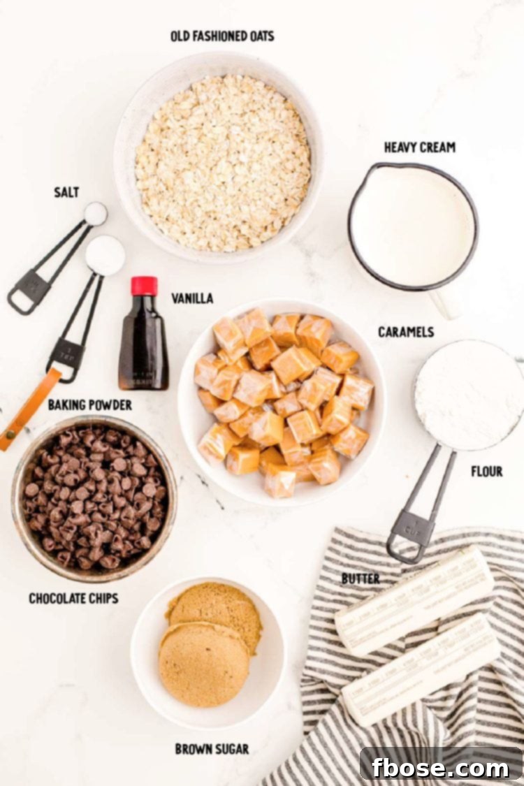 Easy Gooey Caramel Oatmeal Bars 4 Overhead photo of ingredients to make carmelitas on a marble table, neatly arranged.