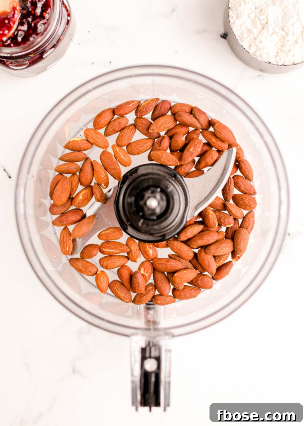 Berry-Filled Linzer Delights 5 Almonds in a food processor.