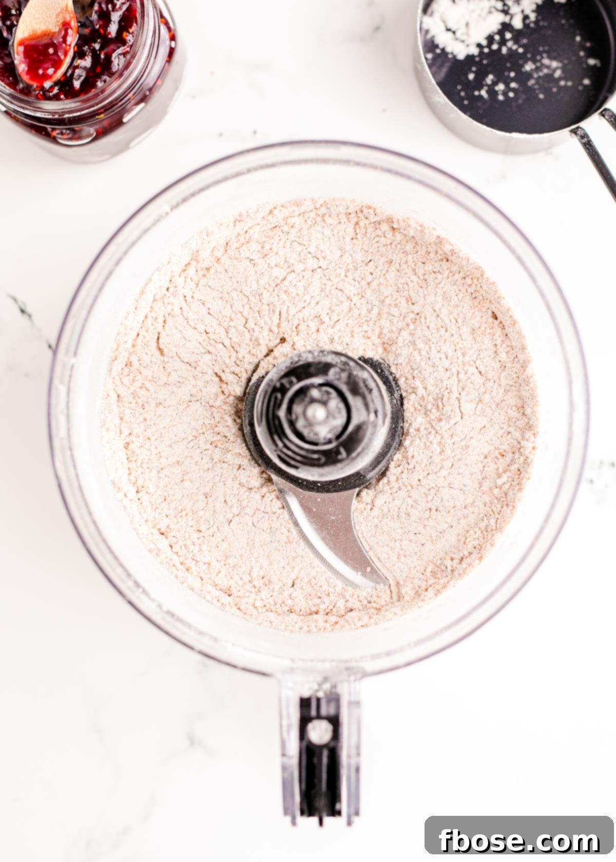 Berry-Filled Linzer Delights 6 Almonds and flour mixed in a food processor.