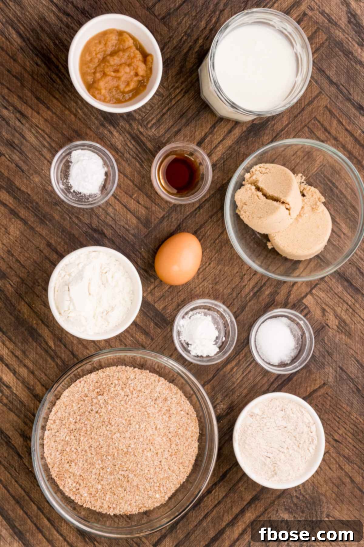 Ingredients to make bran muffins on a wooden table.