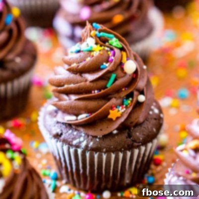 Close up photo of Chocolate Cupcakes on a copper baking sheet.