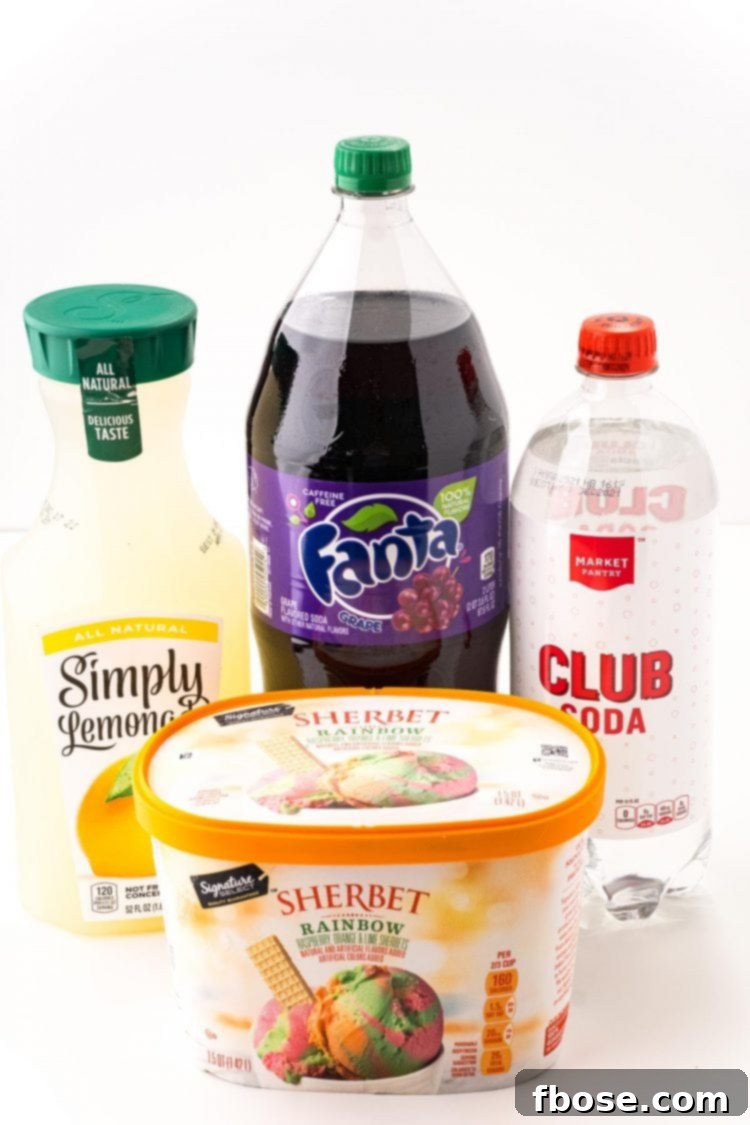 Ingredients used to make witch's brew punch on a white surface.