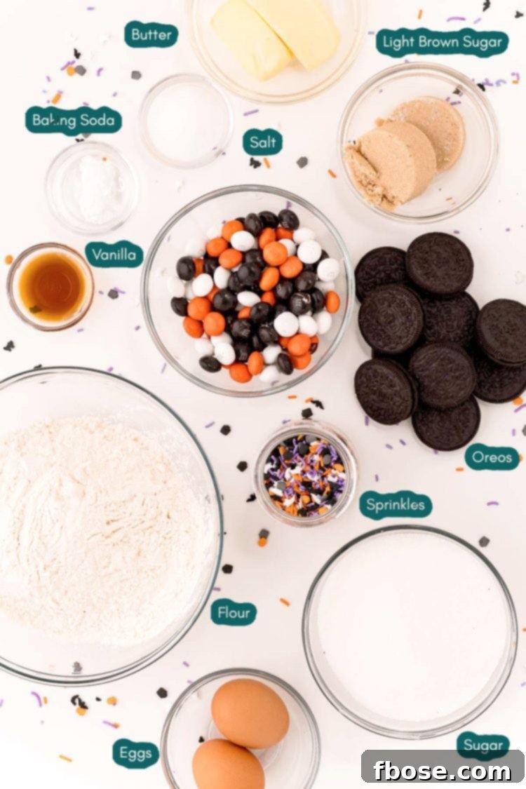Overhead photo of ingredients prepped to make Halloween Cookies and Cream Cookie Bars.