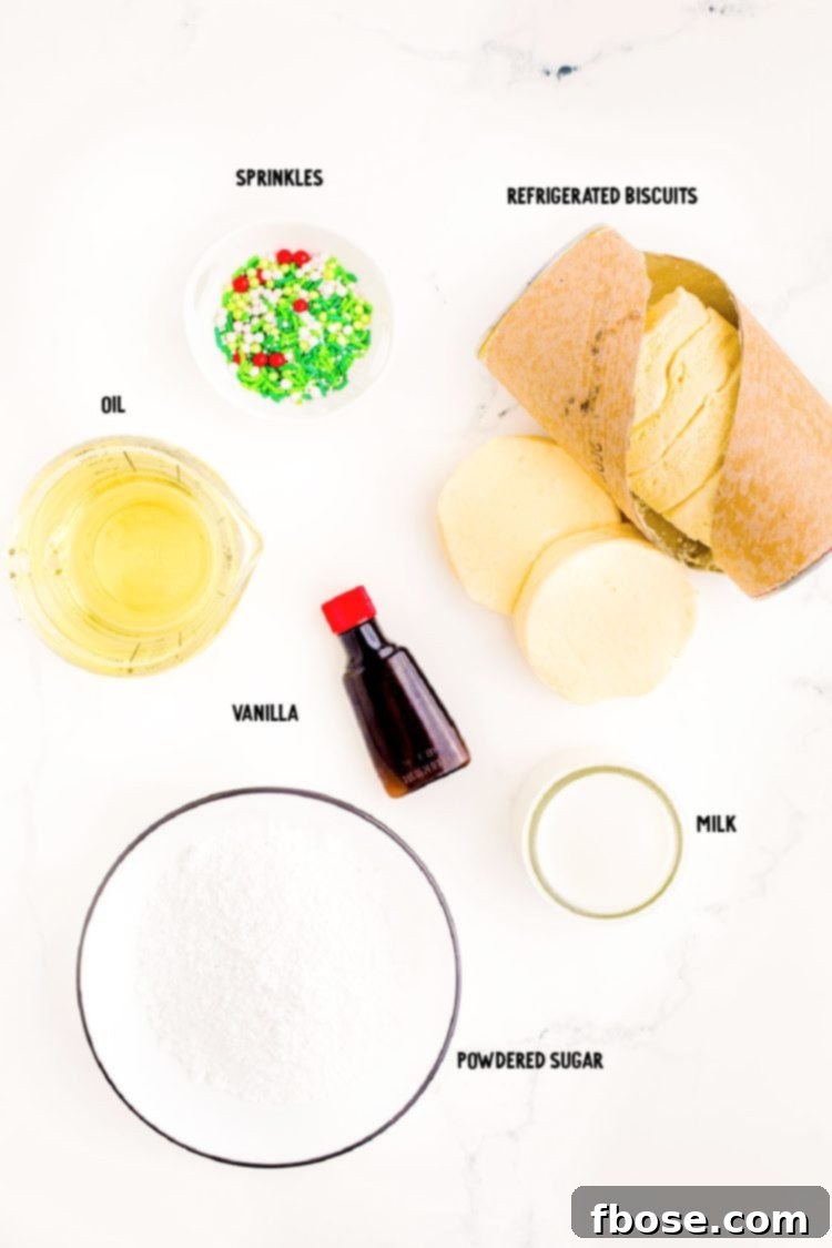 Overhead photo of ingredients to make donut holes from biscuit dough, neatly arranged.