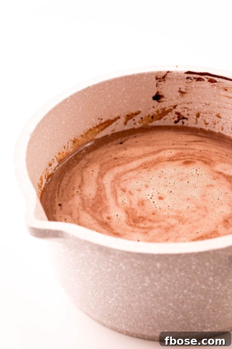 Hot chocolate in a small saucepan.
