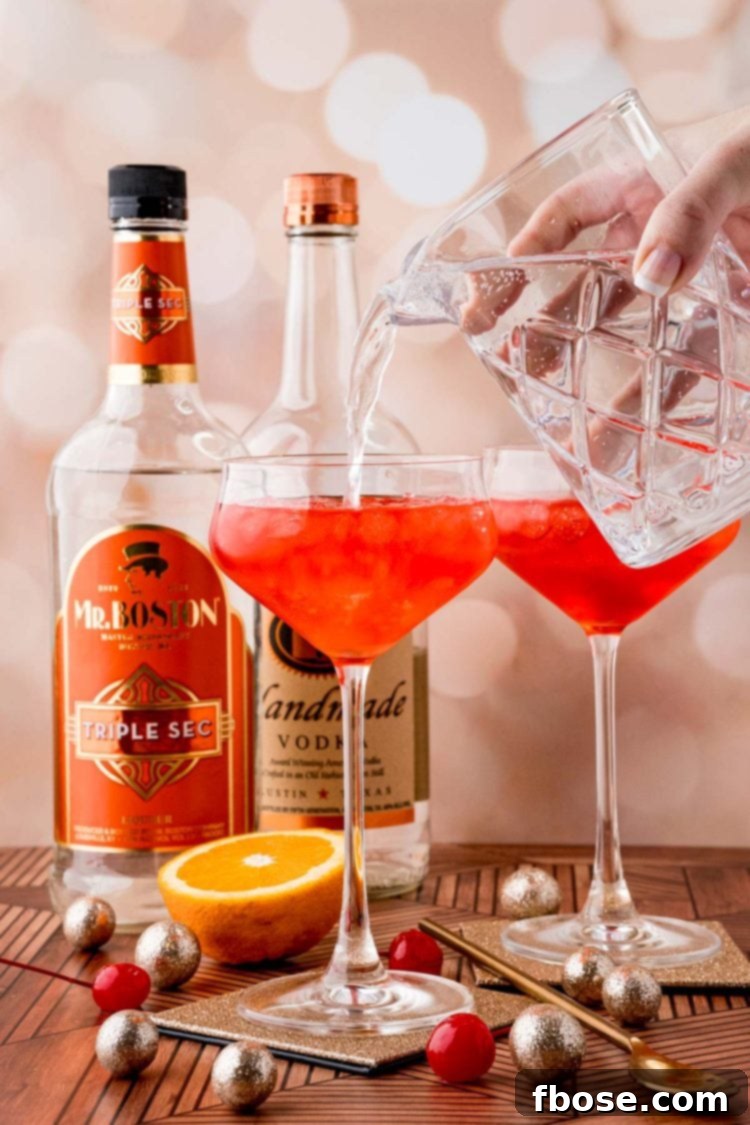 lemon-lime-soda being poured into a coupe glass to make a dirty shirley temple cocktail.