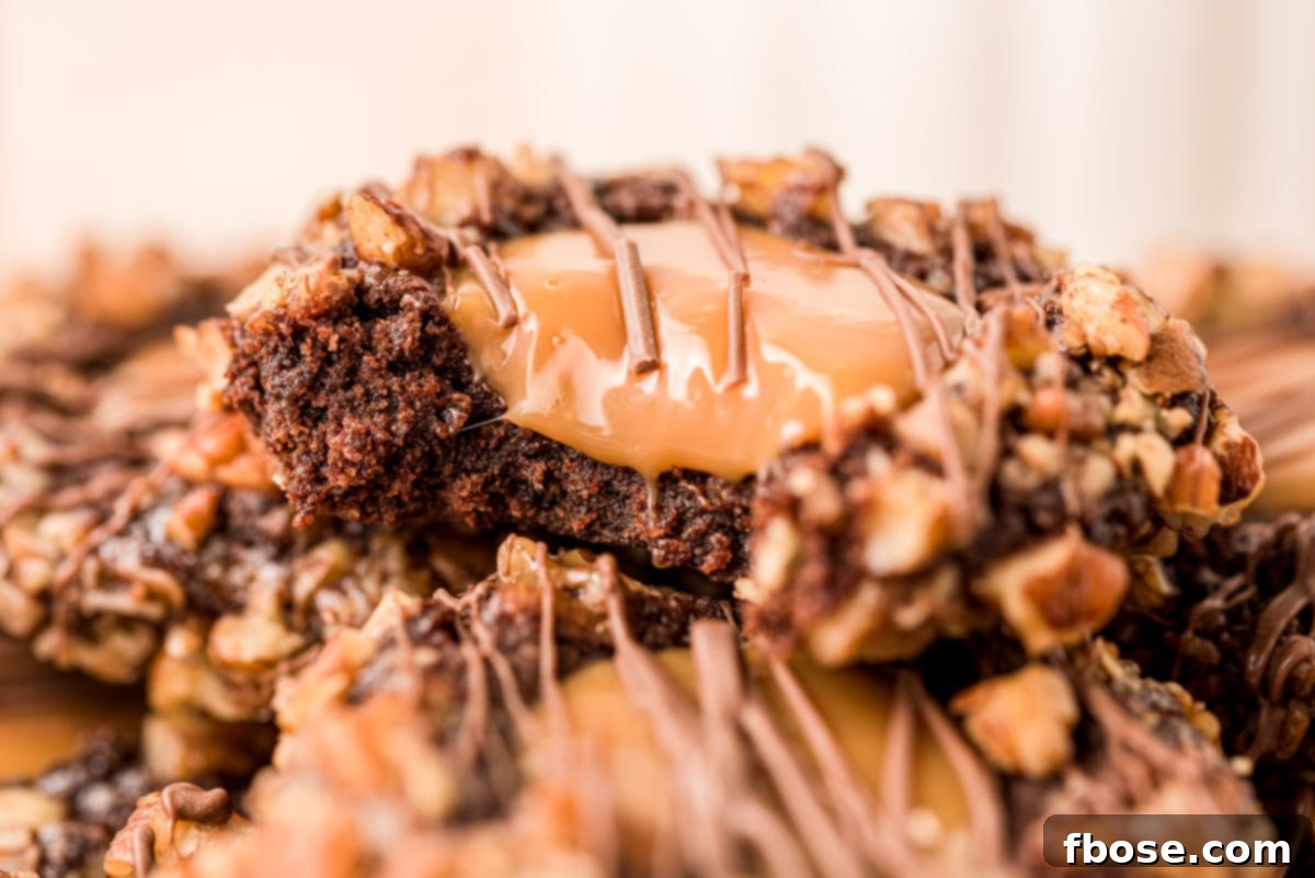Decadent Turtle Thumbprint Delights 4 Close up of a turtle cookies with a bite taken out of it.