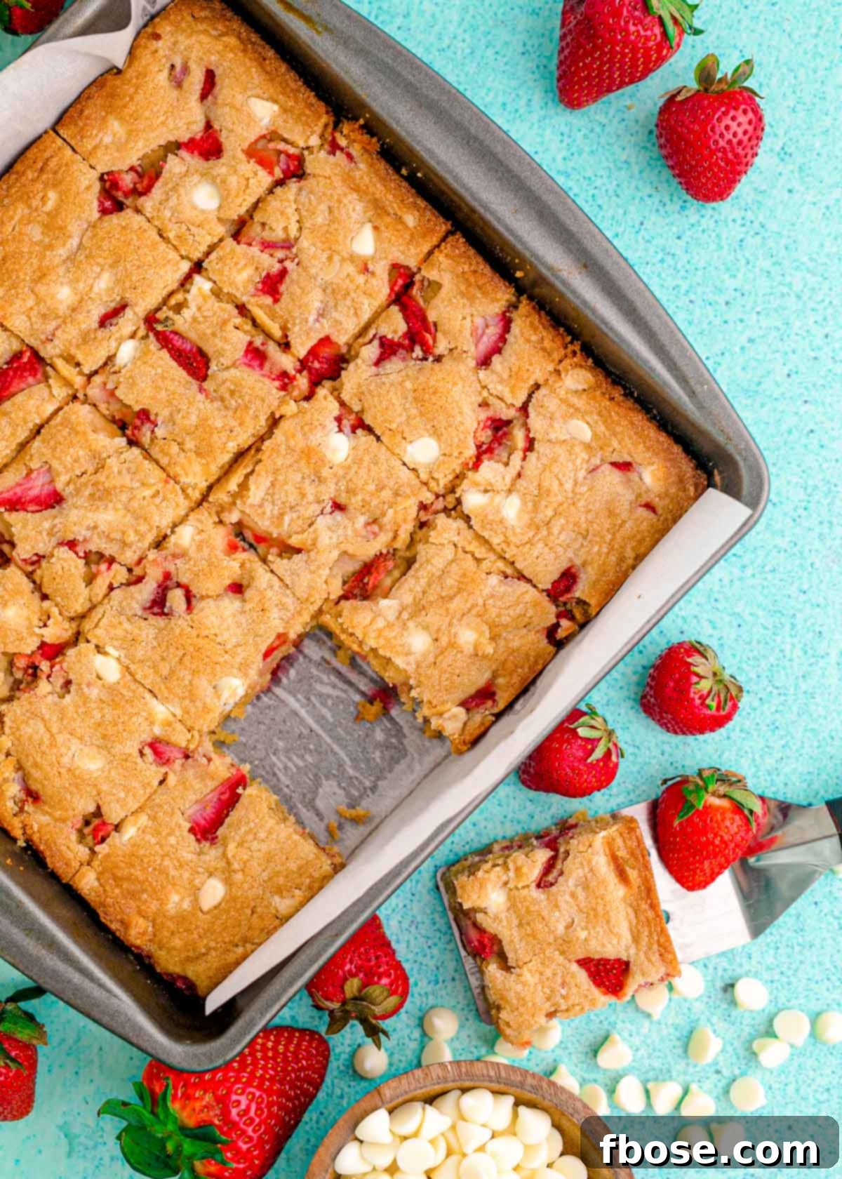 Overhead photo of strawberry blondies in a pan.
