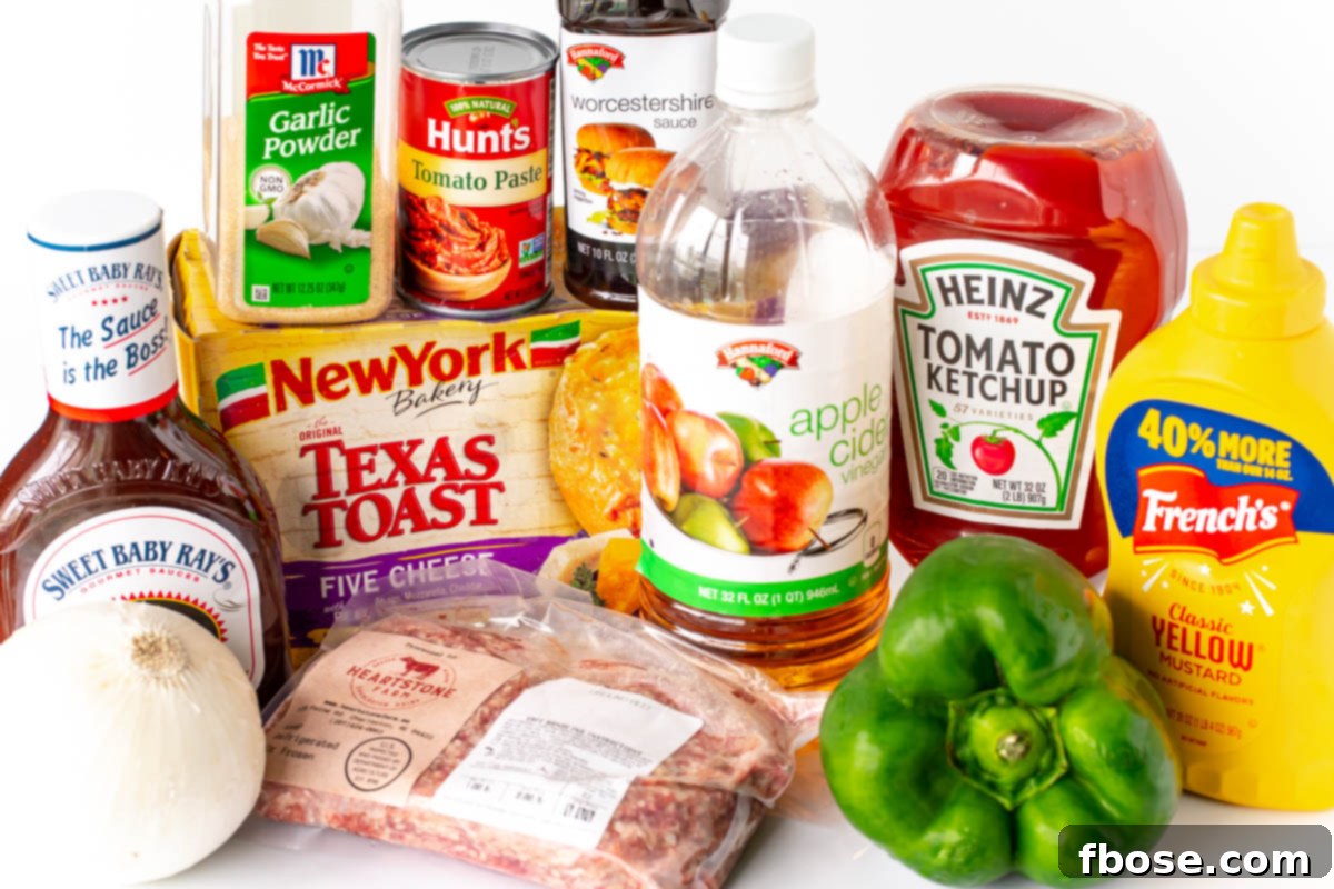 A vibrant display of fresh ingredients laid out on a white table, ready to be used for making Texas Toast Sloppy Joes.