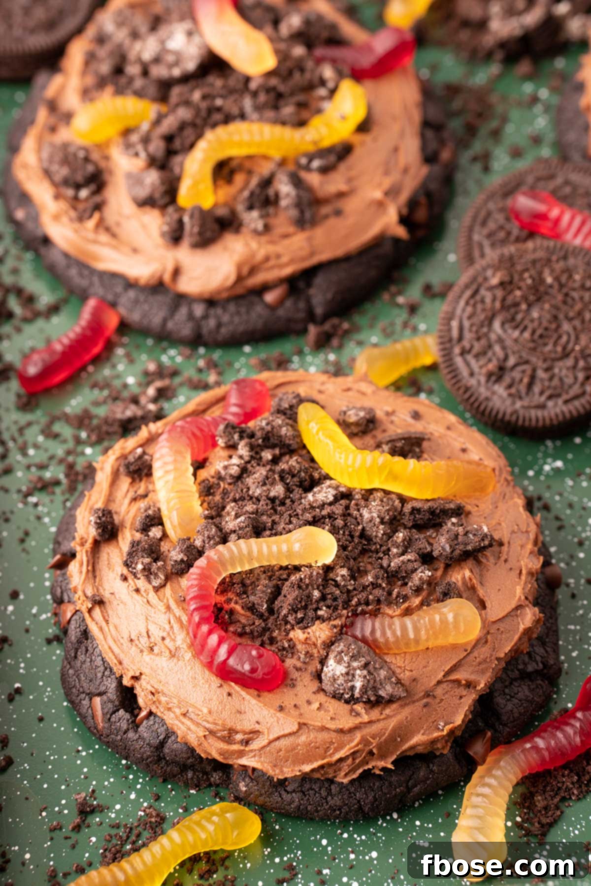 Crumbl Copycat Dirt Cake Cookies on a green surface.