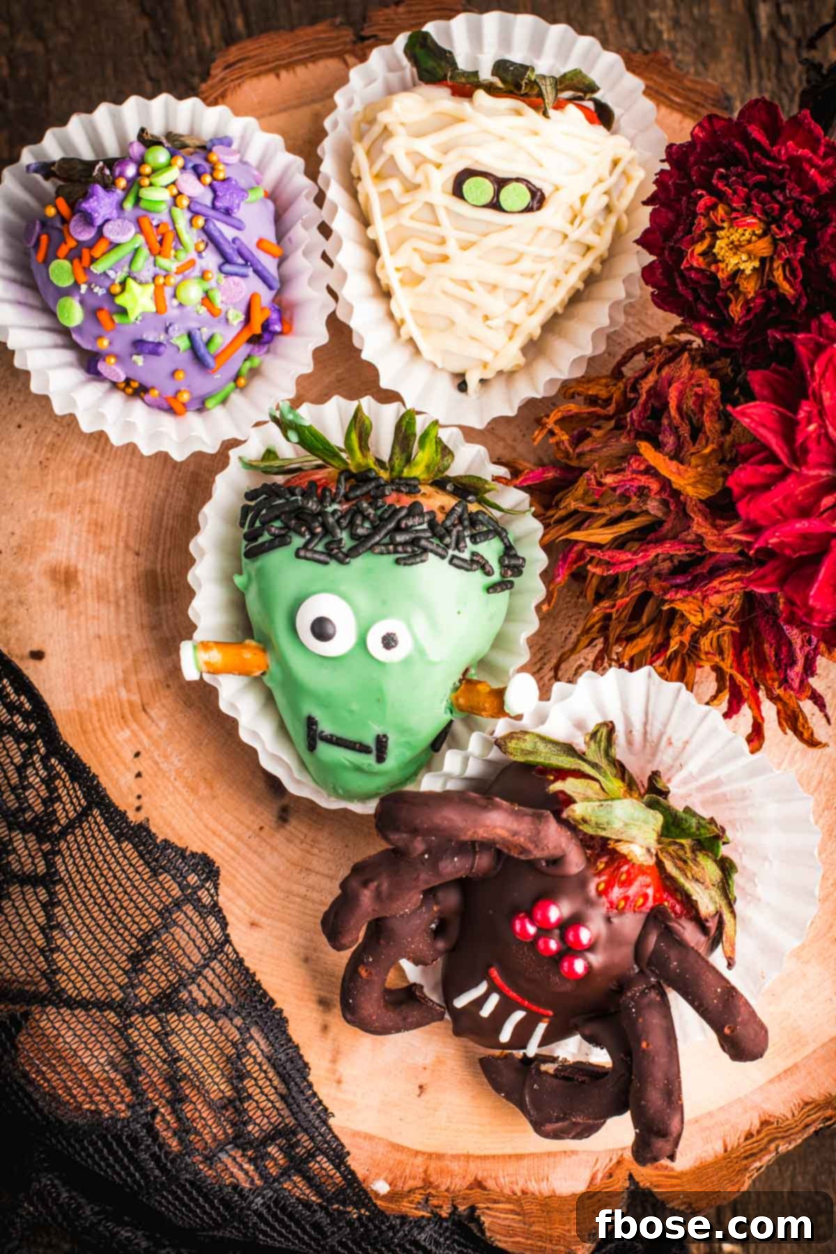Overhead photo of Halloween decorated chocolate covered strawberries.