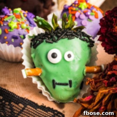 A Frankenstein decorated strawberry.