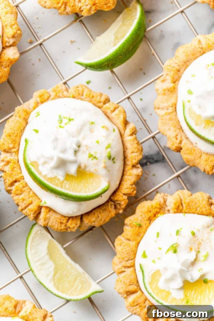 Overhead photo of an assortment of Key Lime Pie Cookies on a wire rack, ready to be enjoyed.