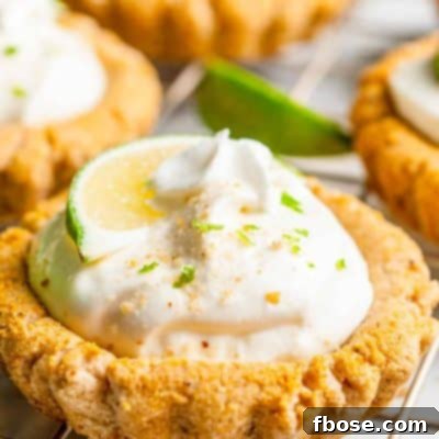 Close up photo of a Crumbl Copycat Key Lime Pie Cookie on a wire rack.