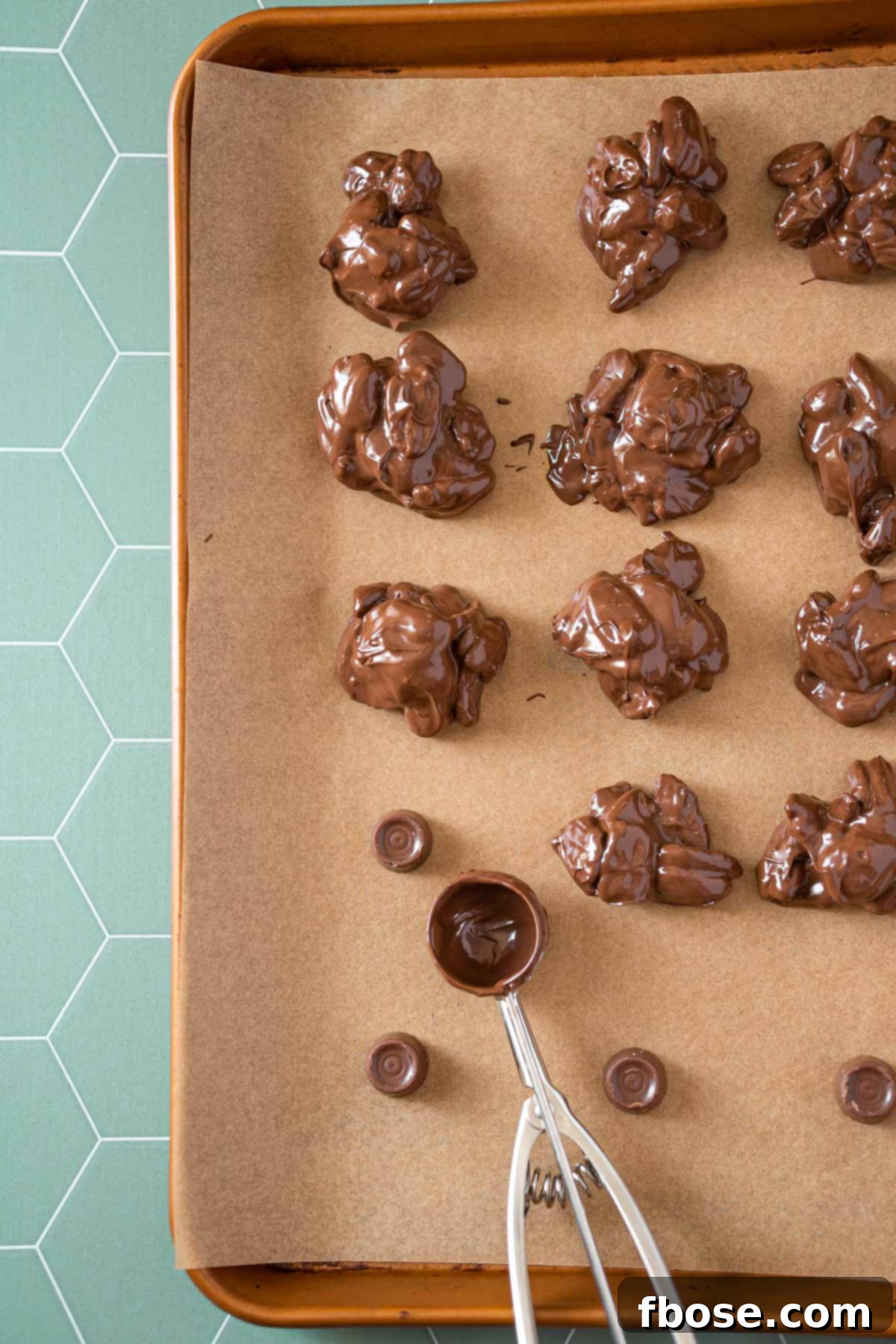 Trutle crockpot candy being made on a baking tray.
