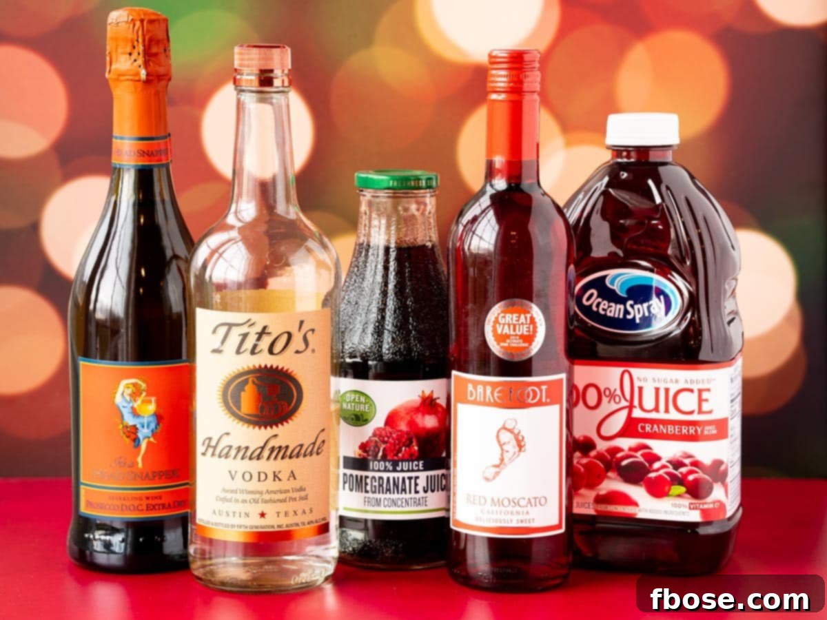Ingredients to make jingle juice on a red surface.