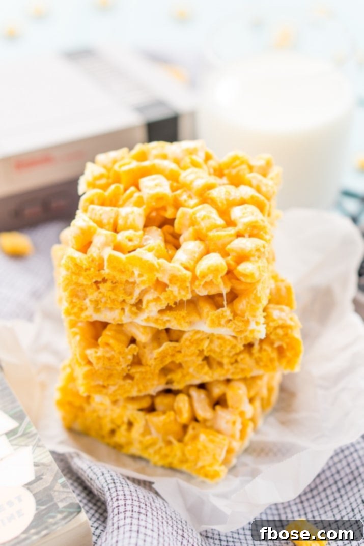 These Cap'n Crunch Treats are a fun twist on classic rice krispies treats and inspired by the book Ready Player One by Ernest Cline. They're the perfect fast dessert or afternoon snack and Cap'n Crunch lovers will go crazy over them!