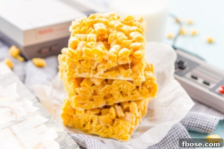 These Cap'n Crunch Treats are a fun twist on classic rice krispies treats and inspired by the book Ready Player One by Ernest Cline. They're the perfect fast dessert or afternoon snack and Cap'n Crunch lovers will go crazy over them!