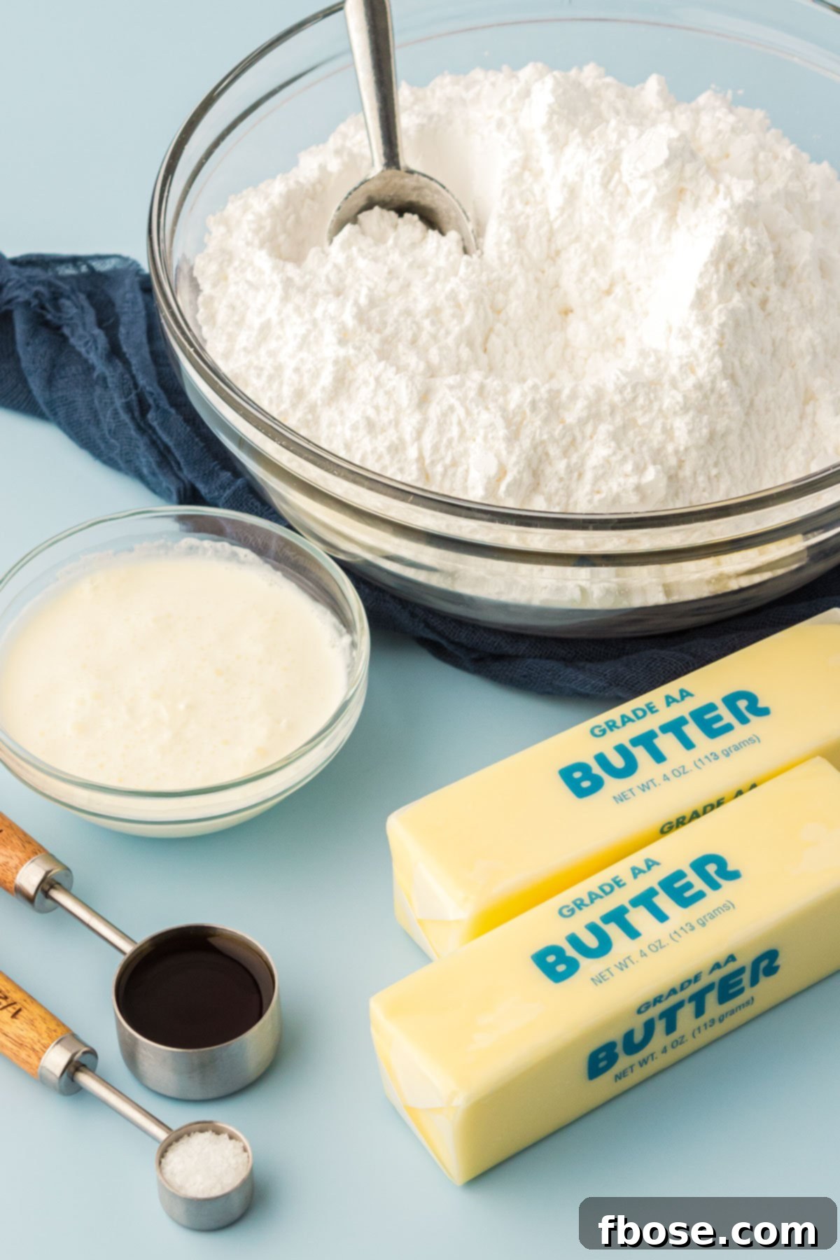 Ingredients to make vanilla frosting.