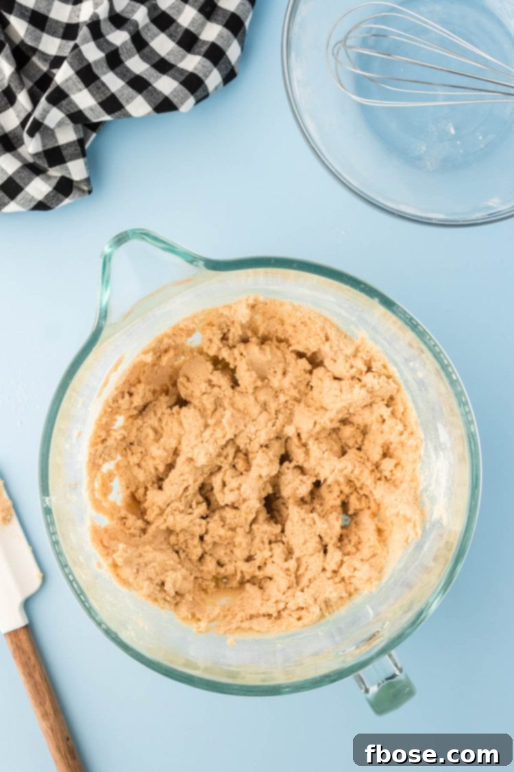 Cookie dough in a mixing bowl.