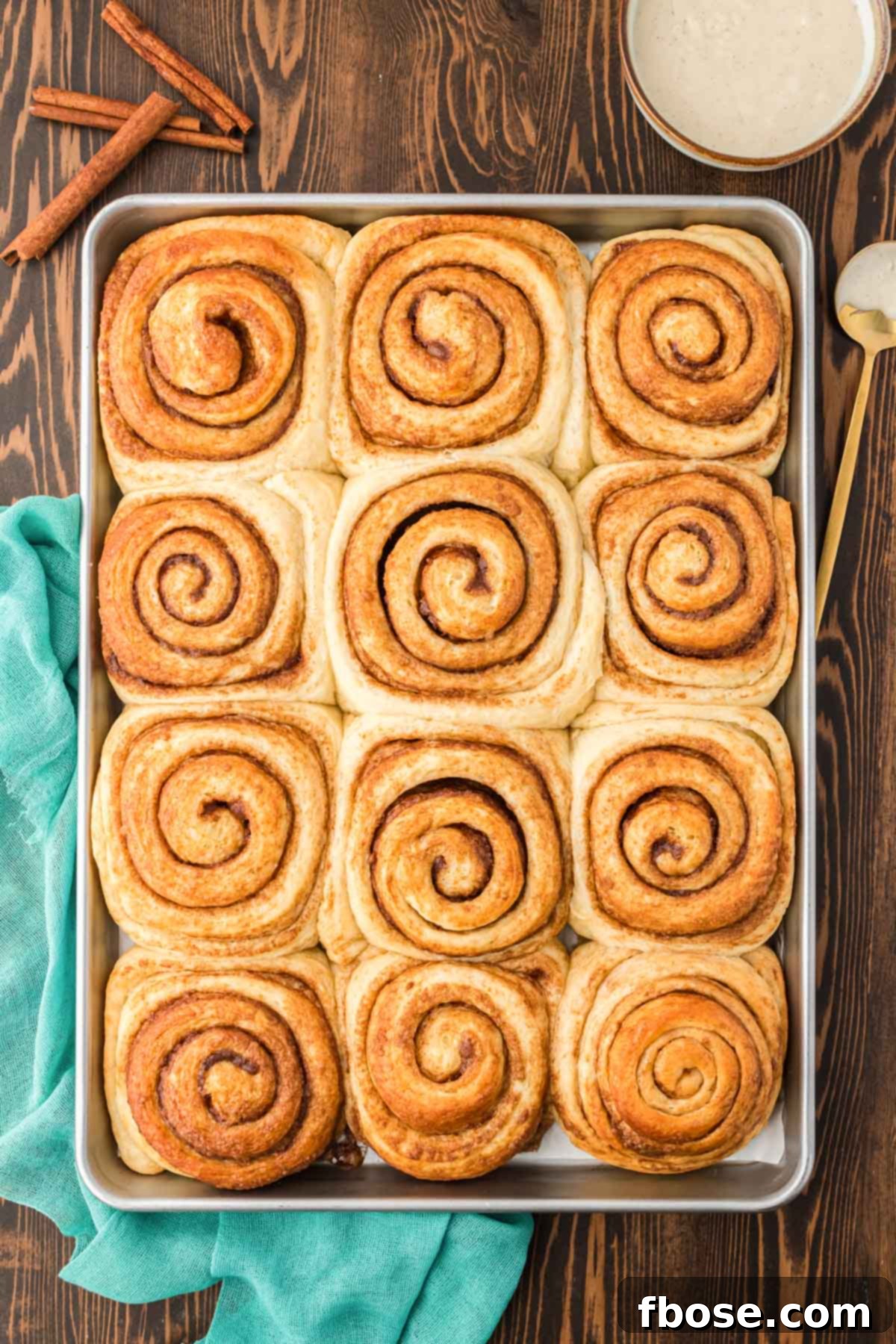 Overhead photo of a pan of cinnamon rolls without icing.