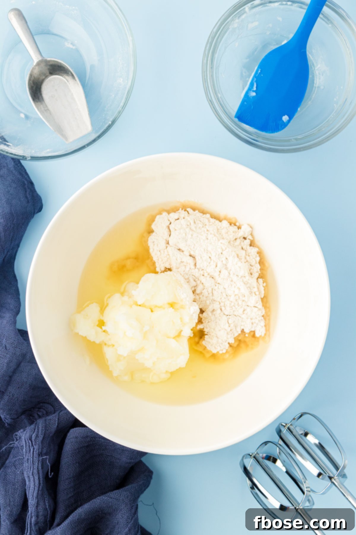 Flawless Cake Release 4 Ingredients for magic pan release cake goop, precisely measured in bowls.