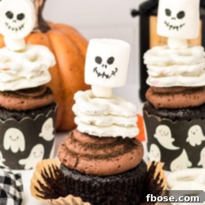 Spooky Skeleton Cupcakes 10 Close up of Halloween Cupcakes decorated like skeletons.