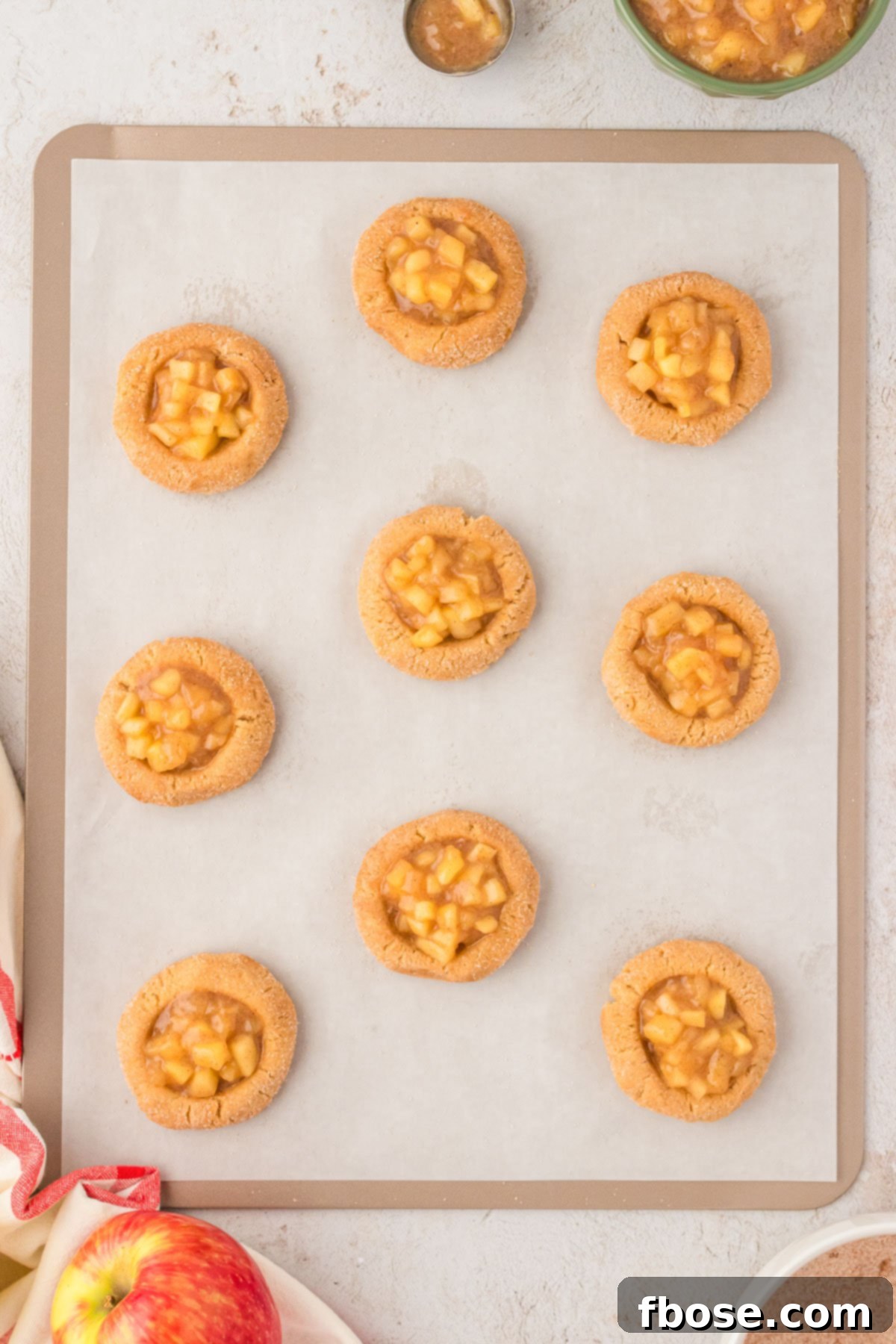 Overhead photo of apple pie cookies ready to be baked.
